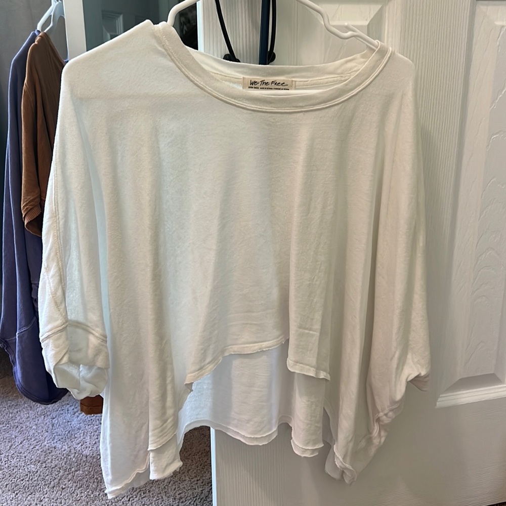 Free people 3/4 sleeve cropped thin material. XS